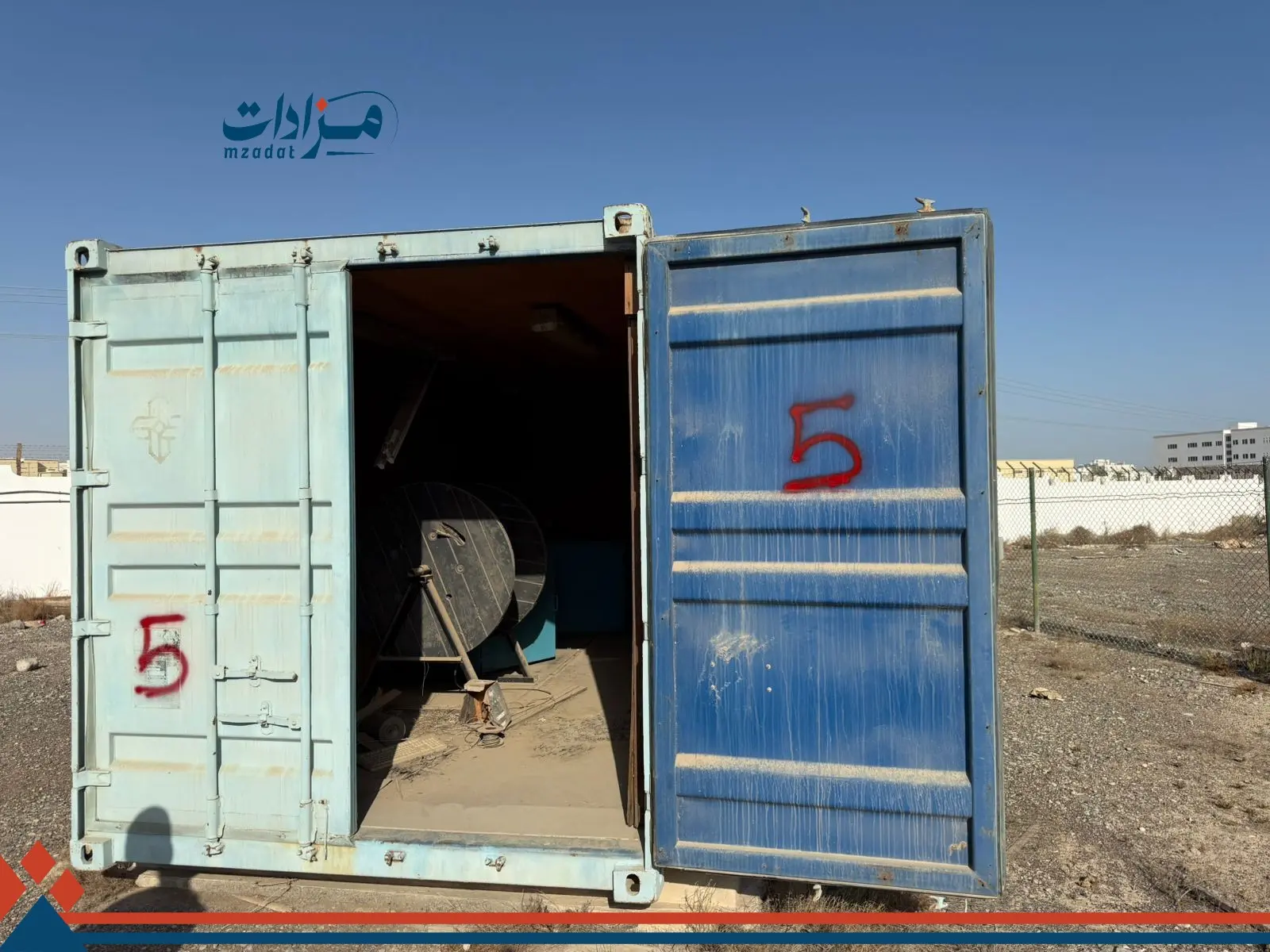 5- Mobile housing unit, garbage containers, and sheet metal - 12