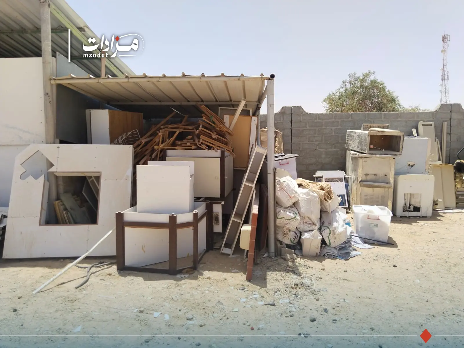 Used electronics, furniture and various scrap materials. - 15