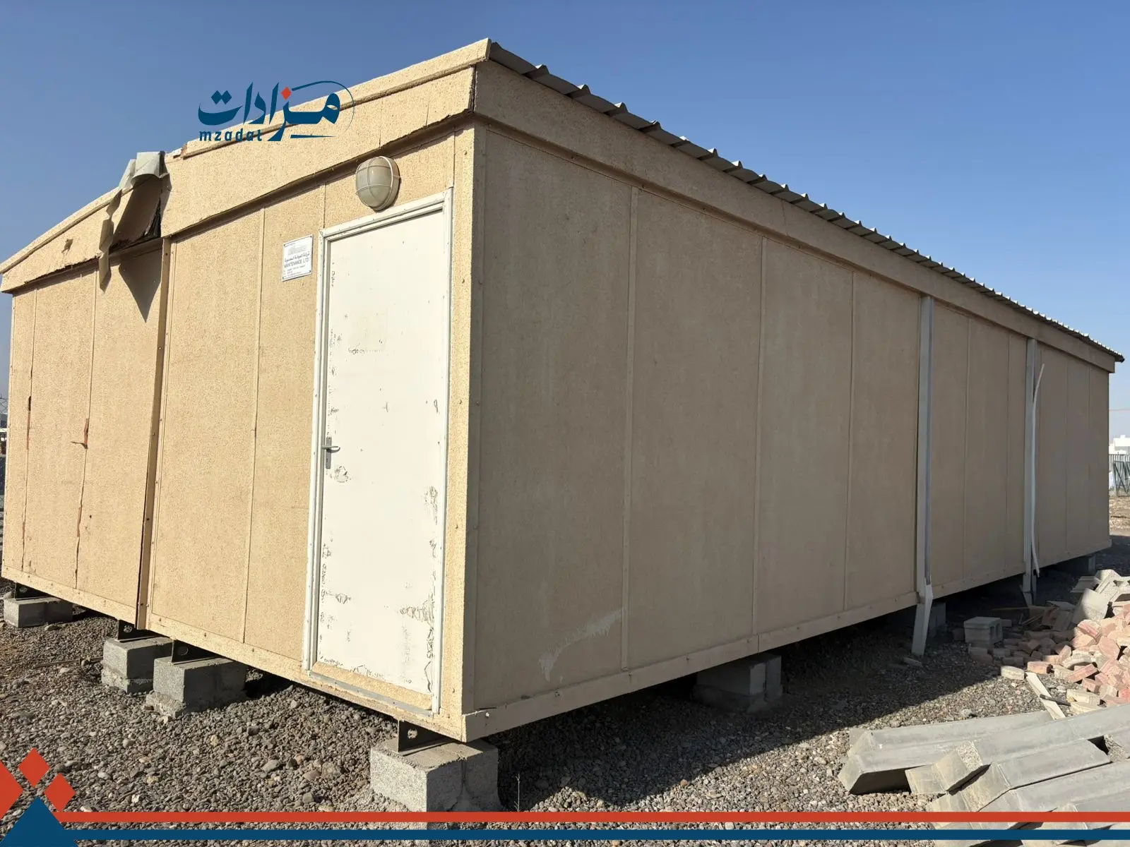 5- Mobile housing unit, garbage containers, and sheet metal - 3