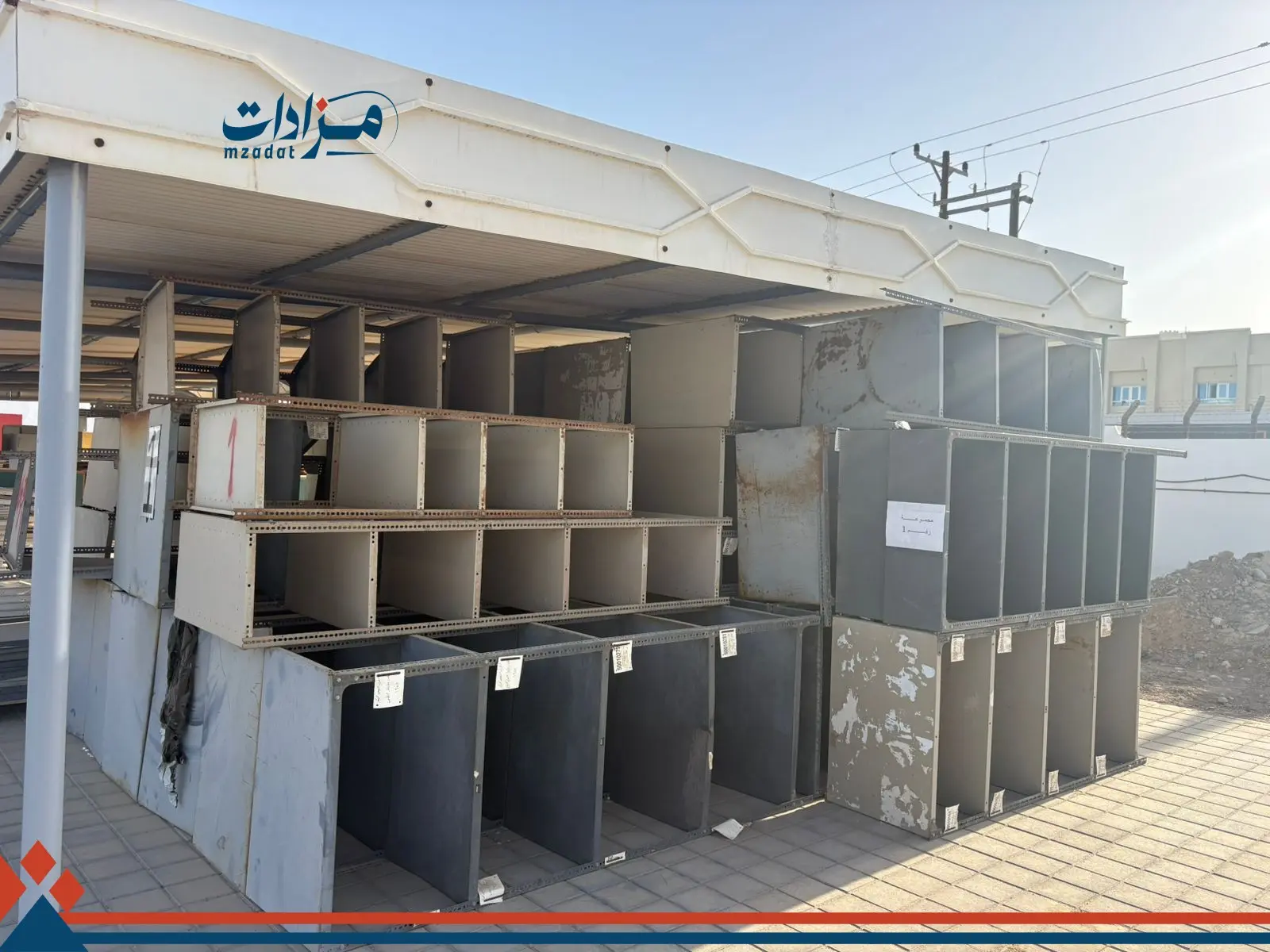 1- Iron and wooden cabinets, printers, and gas cylinders - 2